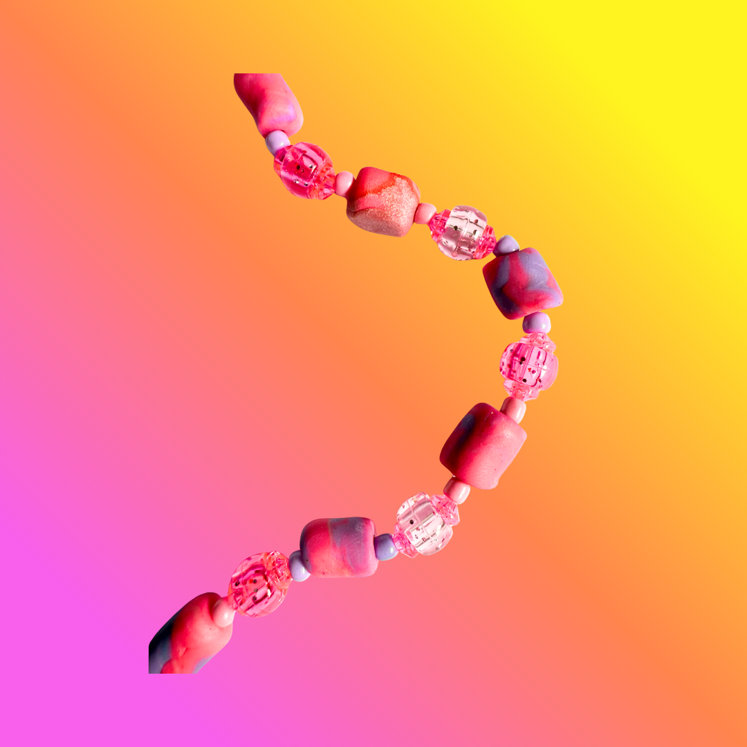 Raspberry Jam Yarn Cutting Pendant